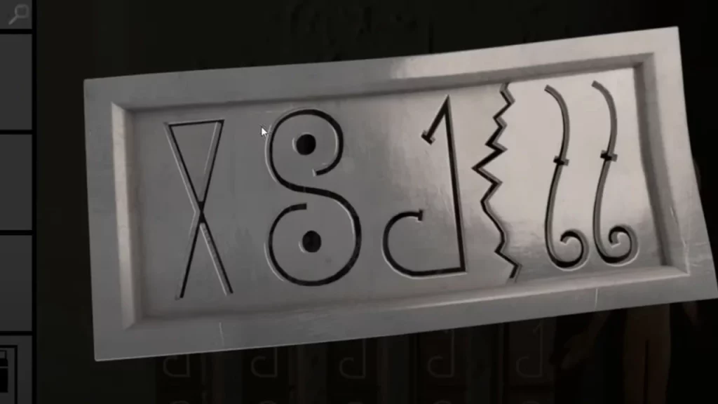 metal tablet with symbols