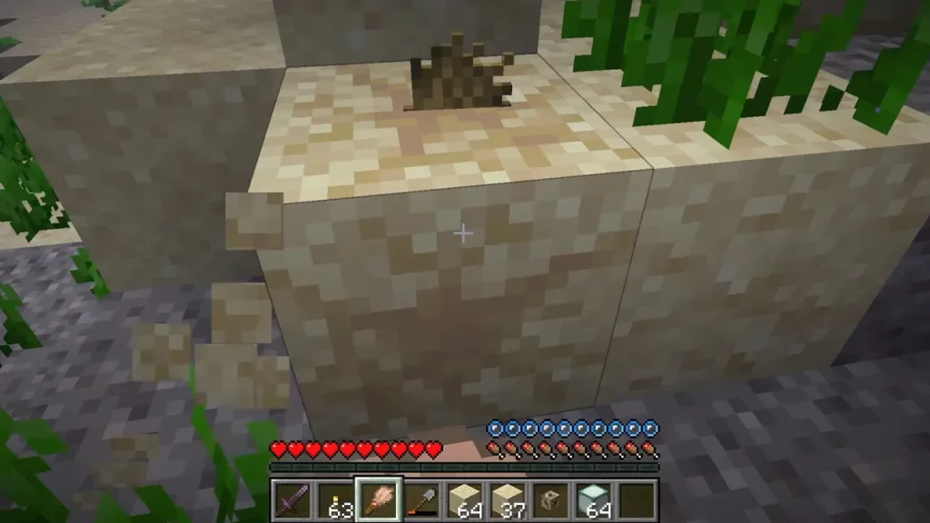 Brush Suspicious Sand in Minecraft to get the Loot